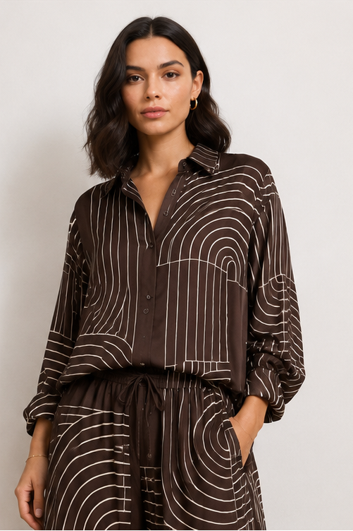 A model is shown in a four-panel collage wearing a dark brown and beige striped matching set consisting of a long-sleeve button-up shirt and wide-leg trousers. The set features a wavy, concentric stripe pattern.
