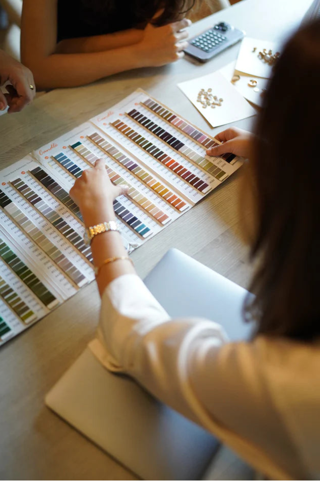 Selection of colorful fabric swatches arranged on a table